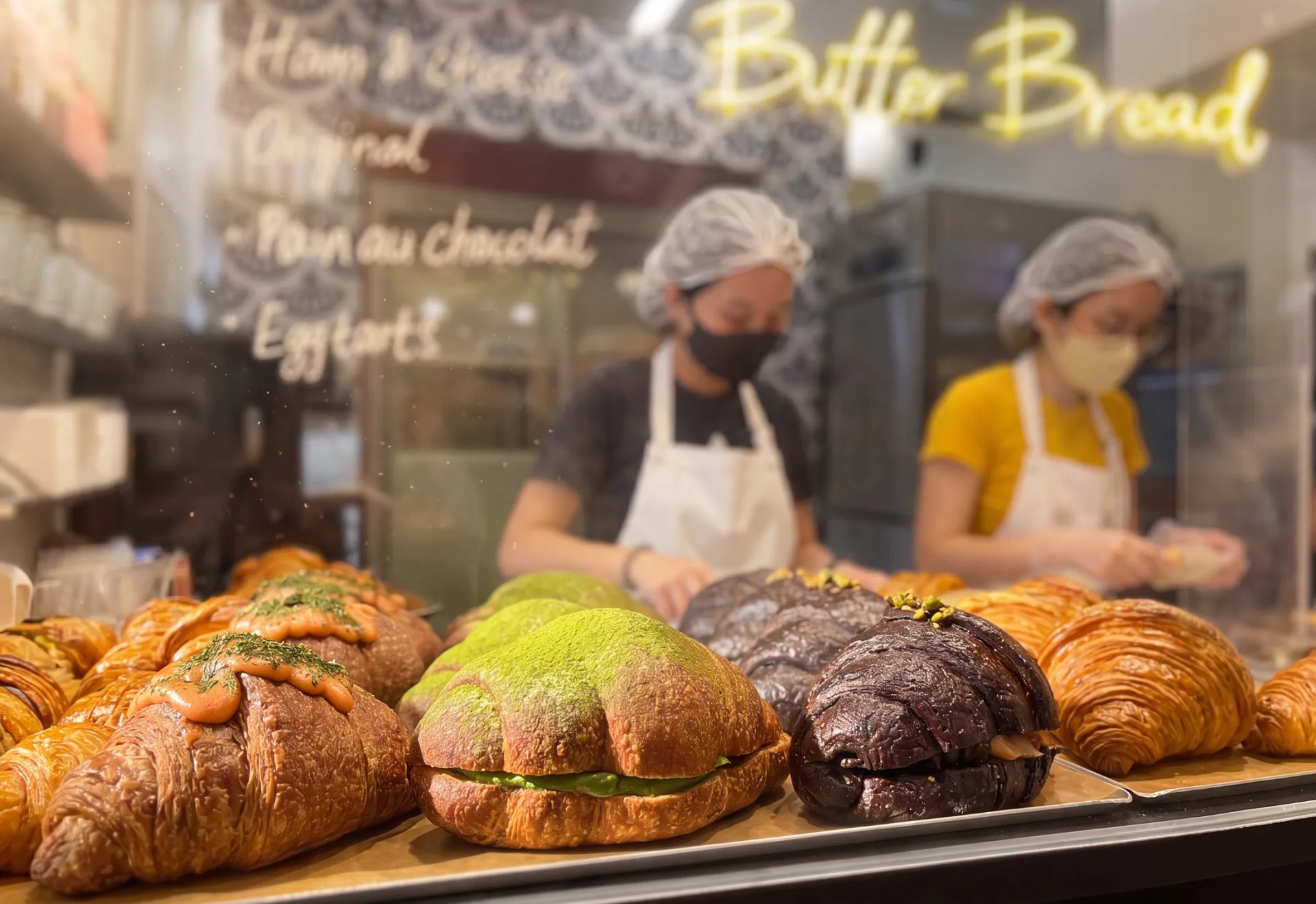 Mentaiko, matcha and chocolate croissants in the display case at the Butter Bread counter, City Gate