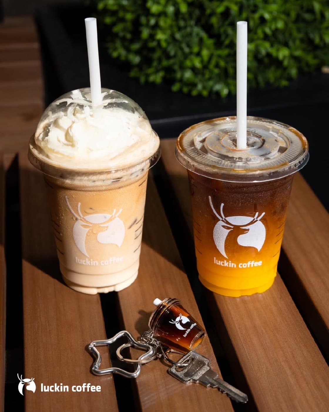 Two iced Luckin Coffee drinks in branded cups at City Gate