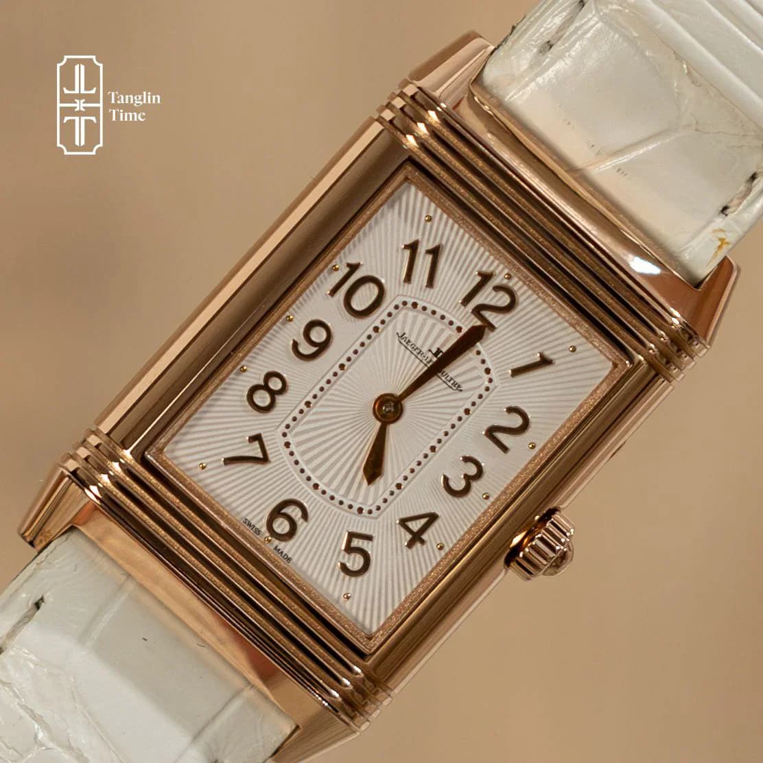 A rose-gold Jaeger-LeCoultre Reverso with a white leather strap, at Tanglin Time