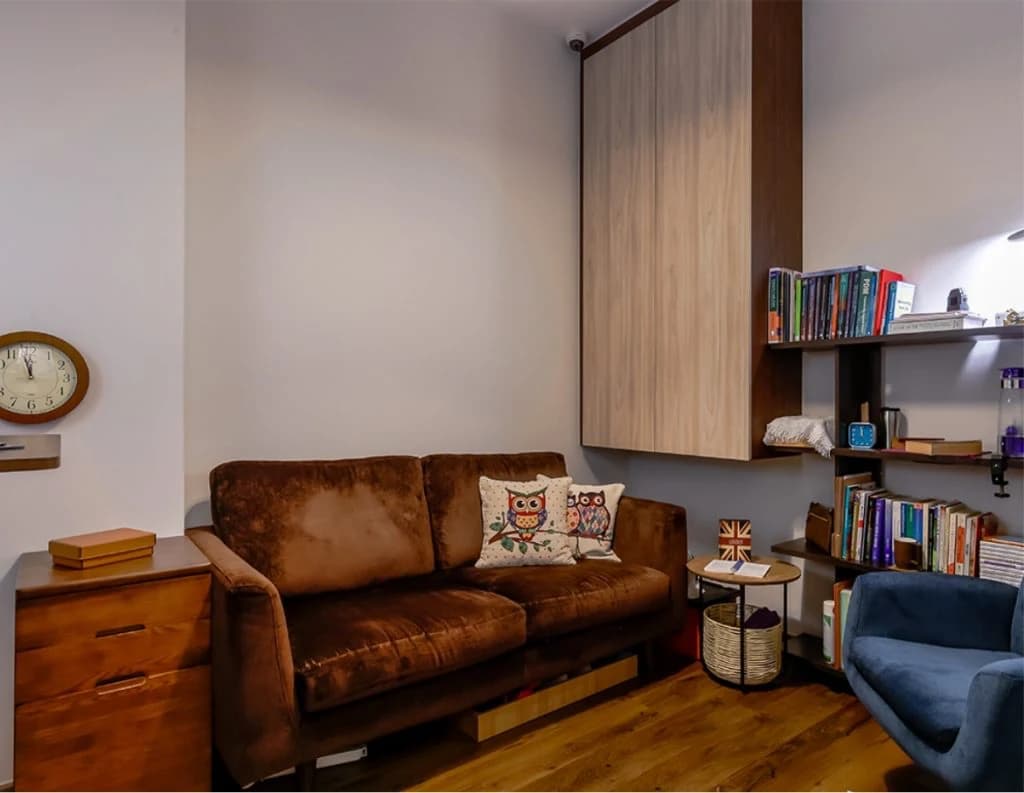 The Caper Spring counselling reception at City Gate, a calm magenta and timber waiting area
