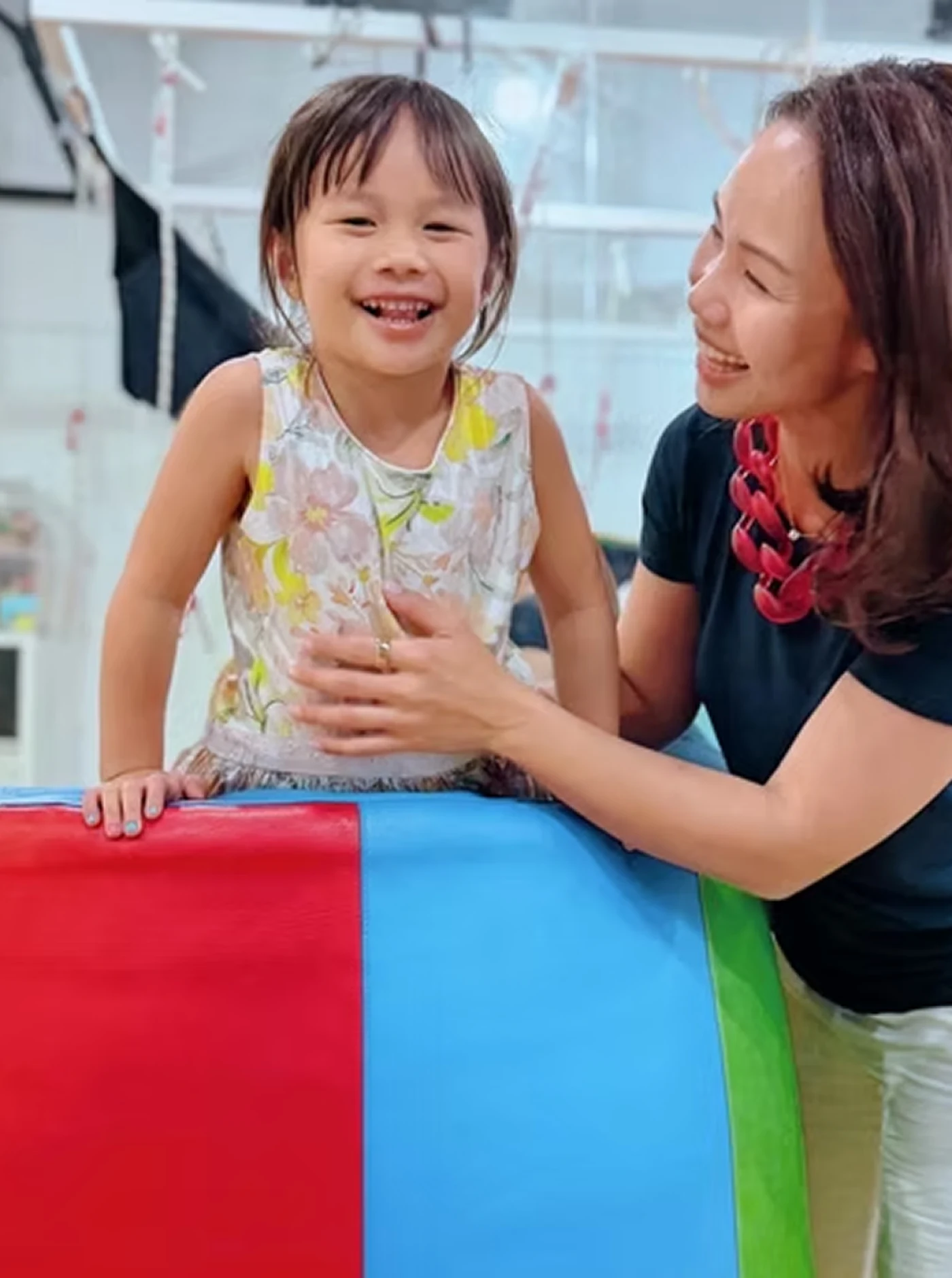 A therapist and a young child playing together during a session at Little Marvels Therapy, City Gate
