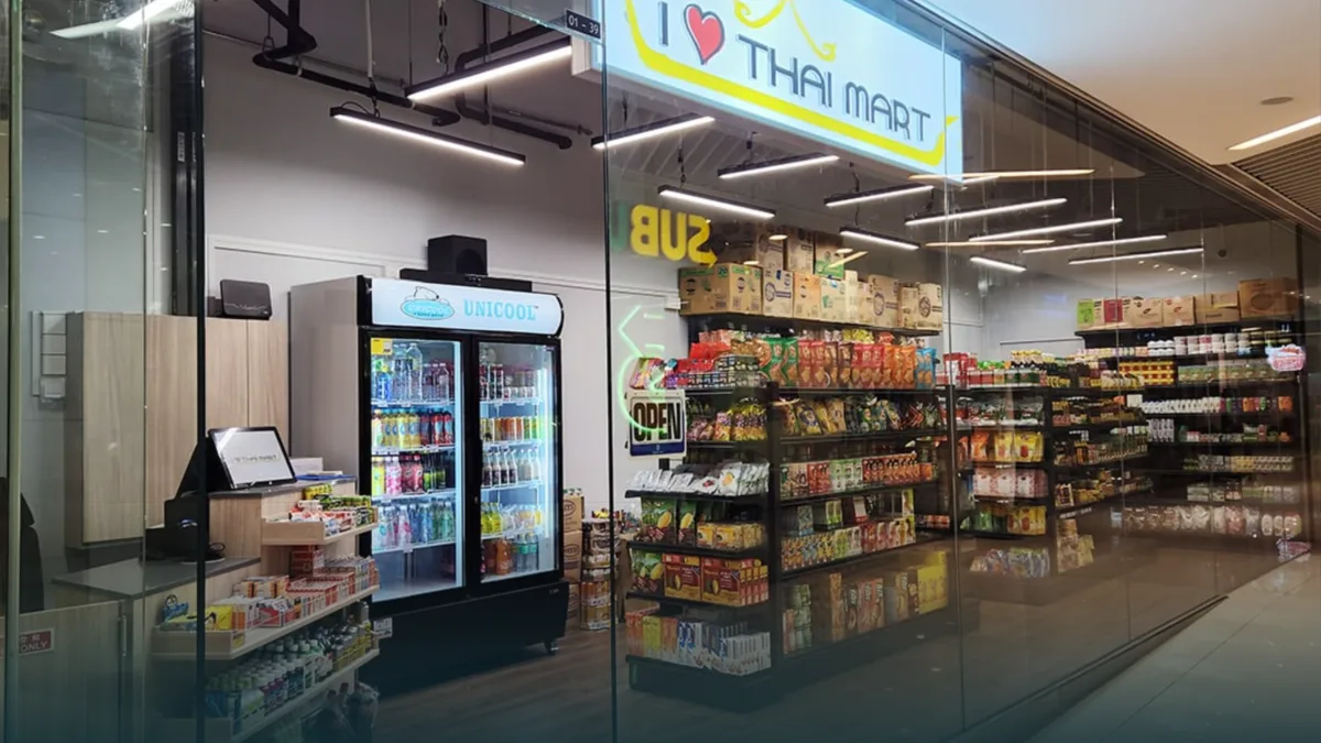 The I Love Thai Mart storefront at City Gate, shelves of Thai groceries behind the glass