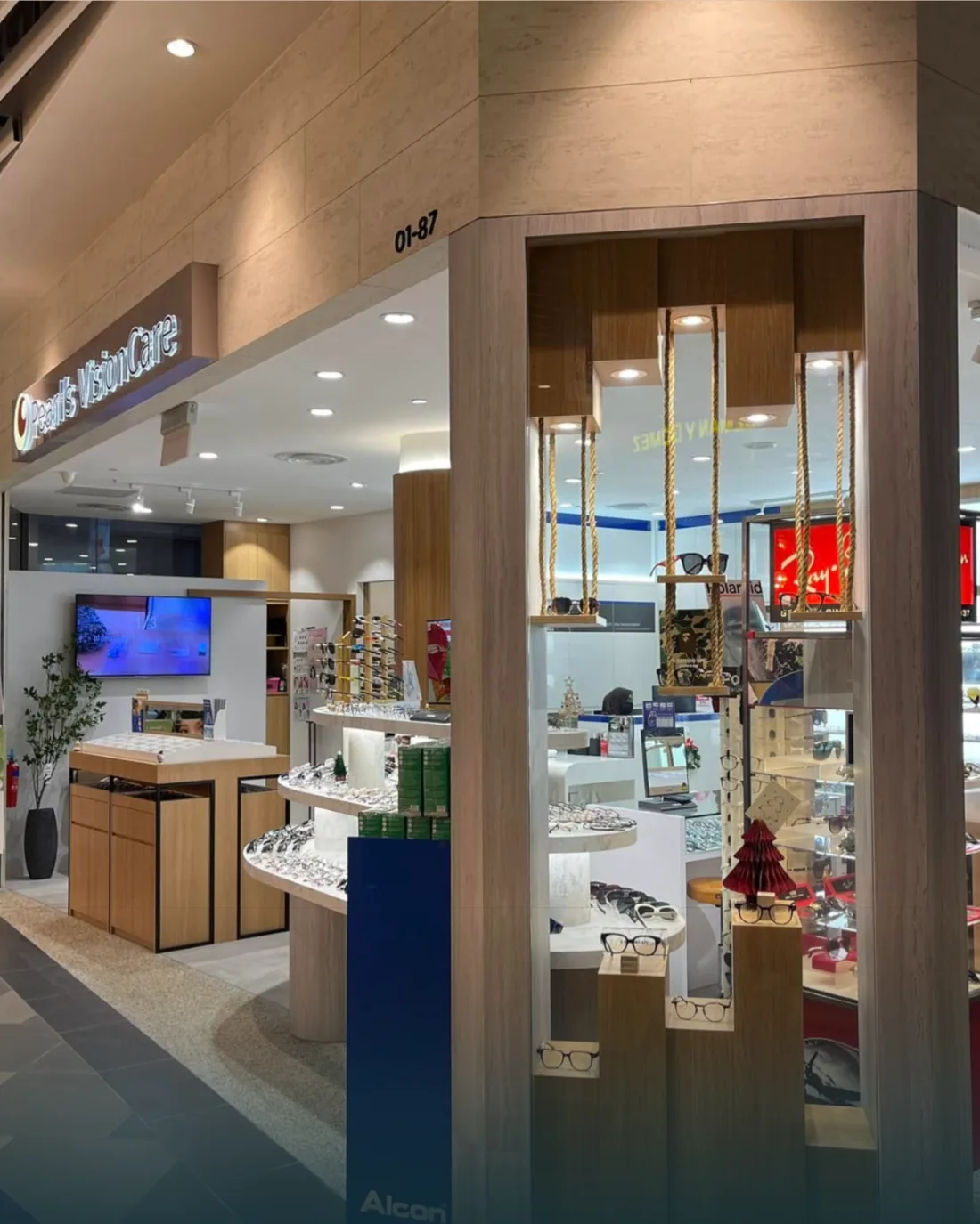 The Pearl's Vision Care optical centre storefront at City Gate, frame displays under its sign