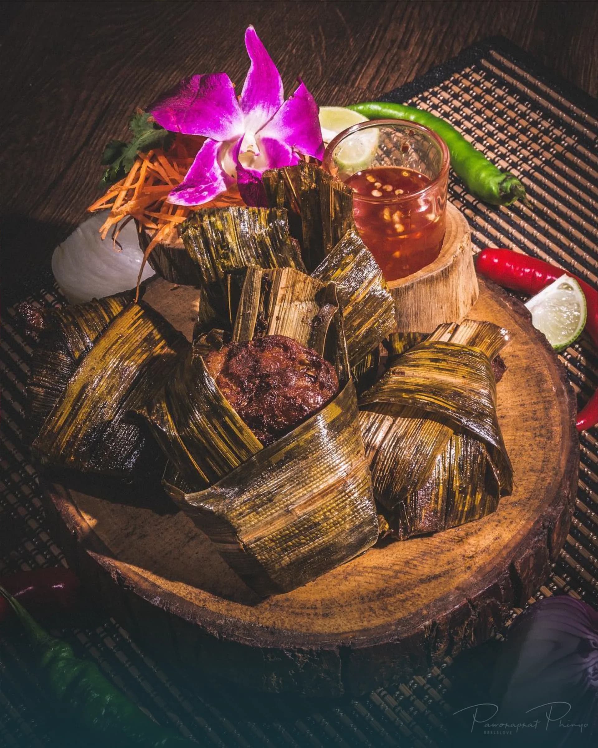 Pandan-wrapped chicken with dipping sauce, orchid and lime at Beerthai House, City Gate