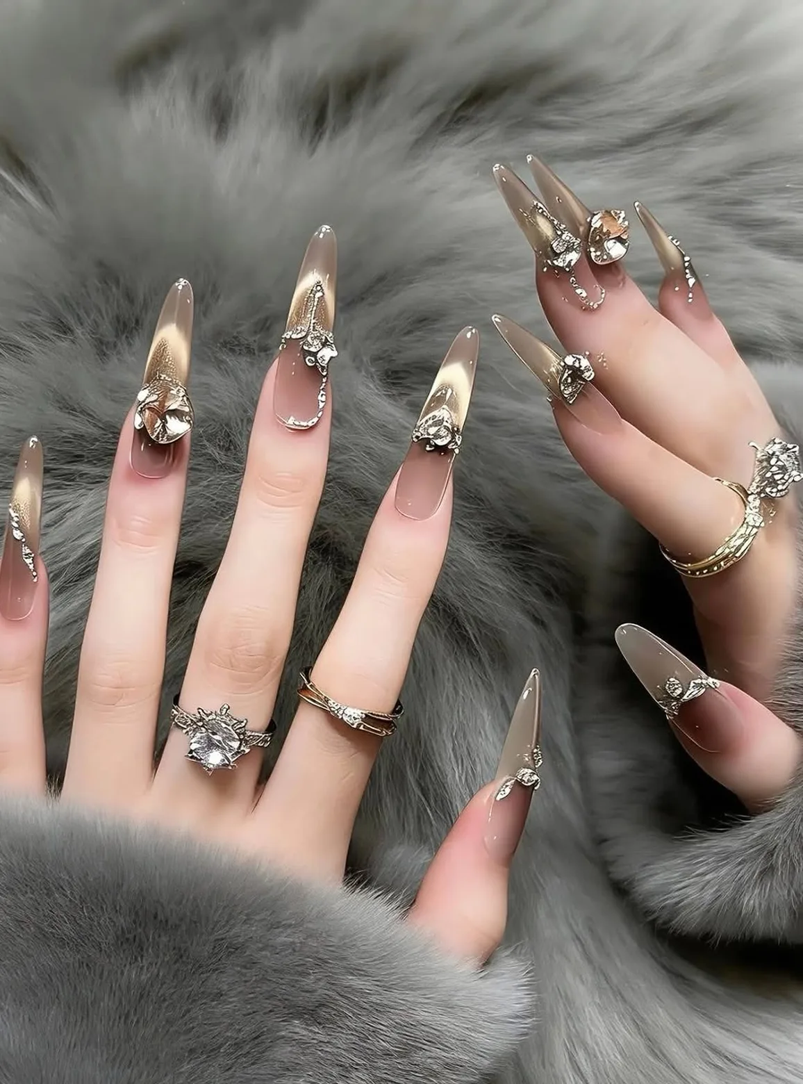 Ornate gilded nail art with crystal-set rings, a beauty look from the City Gate Wellness Hub