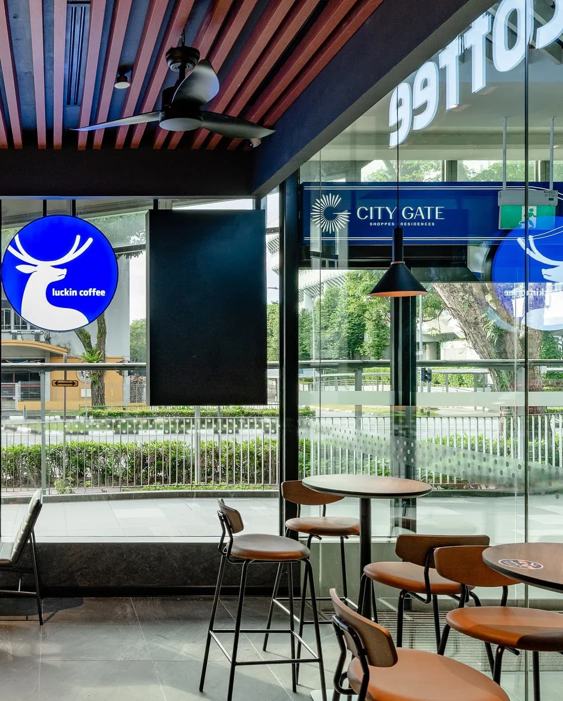 The Luckin Coffee outlet below the City Gate signage on Beach Road